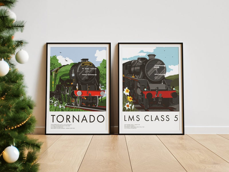 Framed Tornado and LMS Class 5 steam locomotive prints beside a Christmas tree